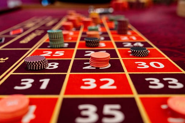 Our bosvegas live dealer studio with card table and dealer camera